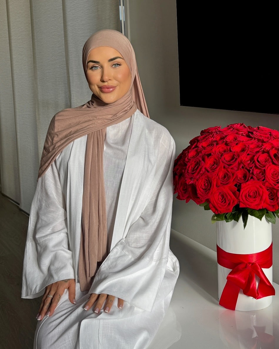 Aya Linen Abaya with Nude Hijab and red roses beautiful smiling model hijabi sydney australia