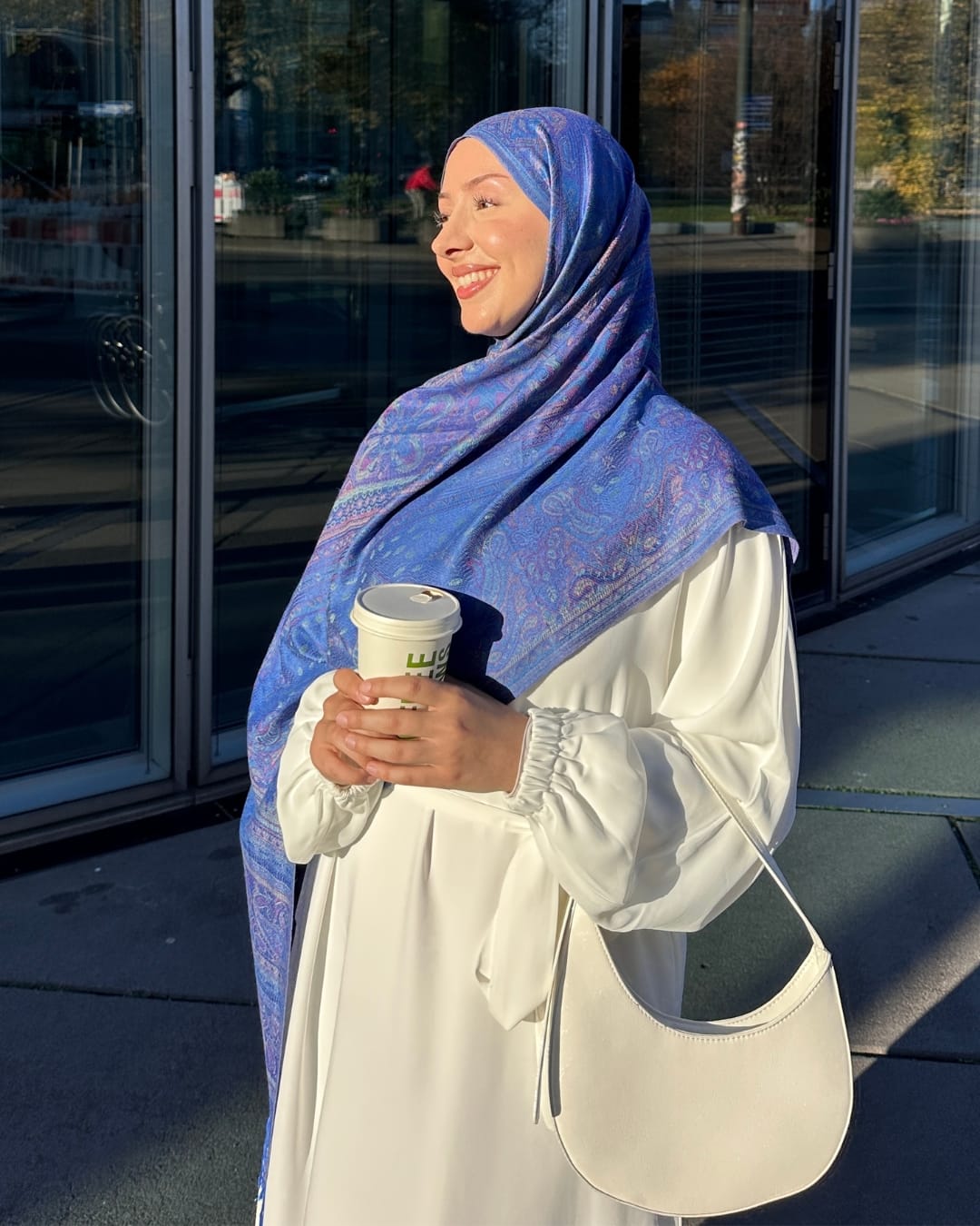 beyzo wearing essential white abaya and pashmina hijab