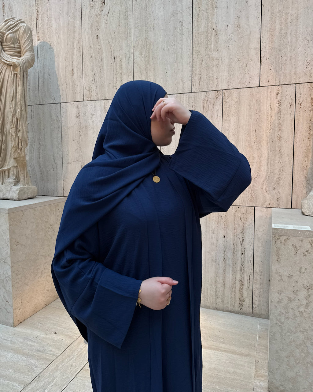 Crinkle Navy Hijab Why she isn't wearing hijab?