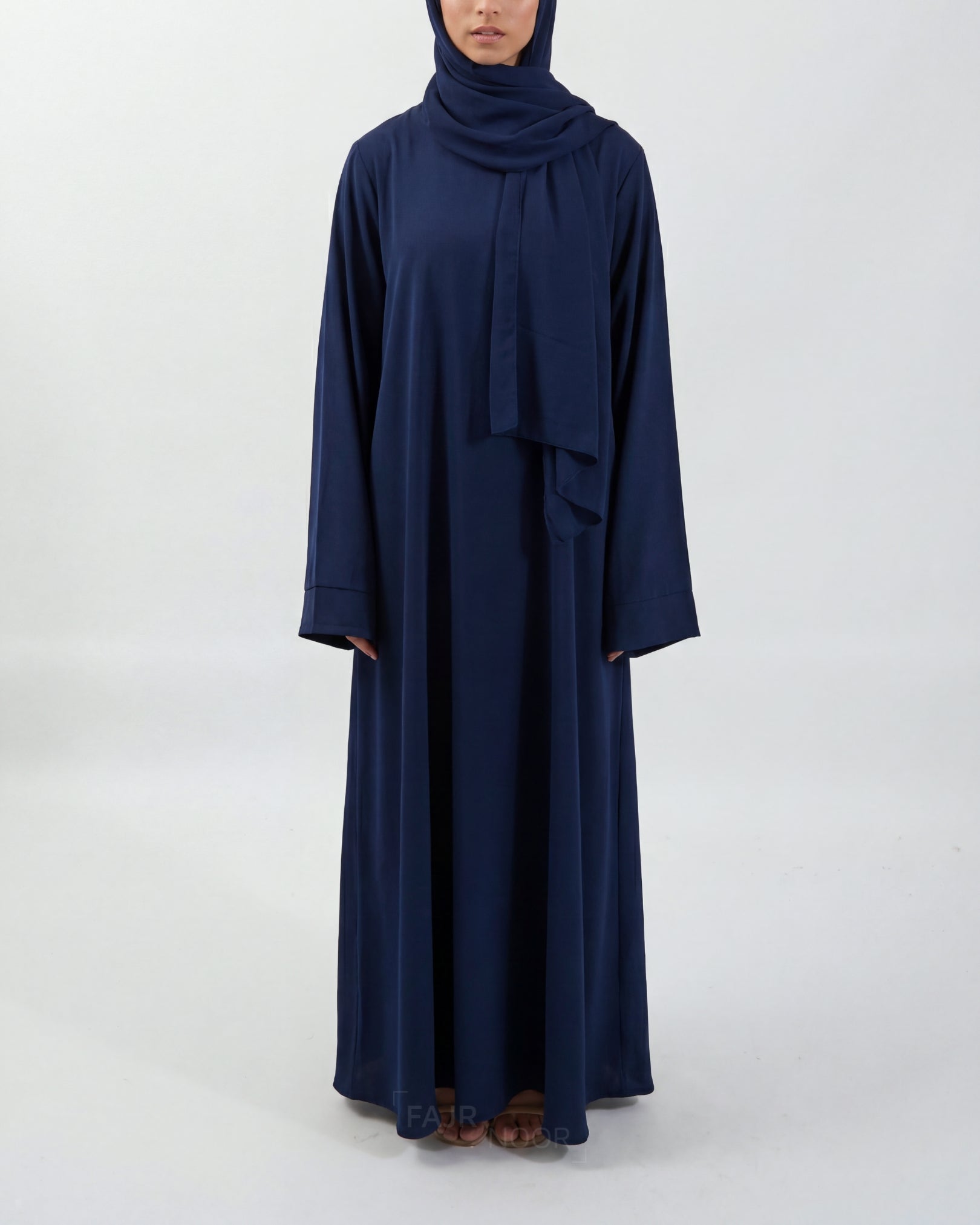 Navy blue abaya on a white background