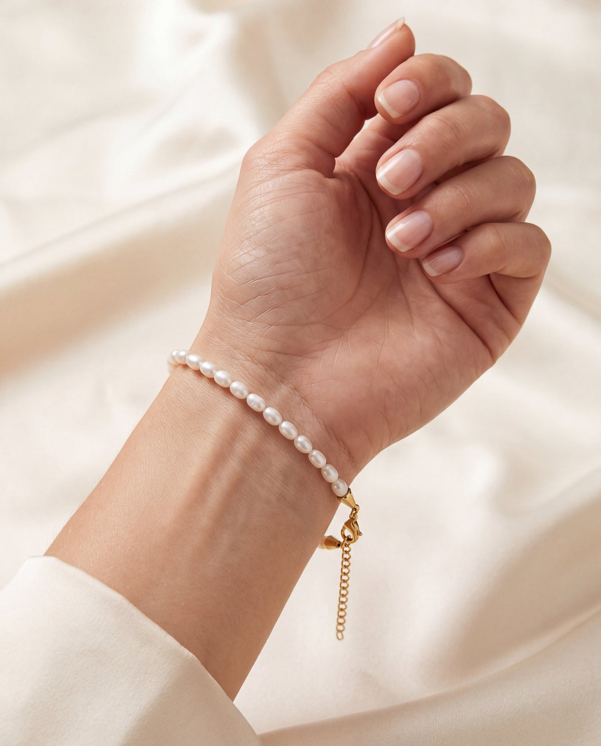 pearl tasbih bracelet on women arm product