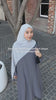 grey abaya hijab wearing woman