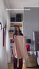 Woman wearing the Fajr Noor Sarah Set in beige, a matching modest co-ord top and pants, styled with a white pashmina hijab for an elegant hijabi outfit look.